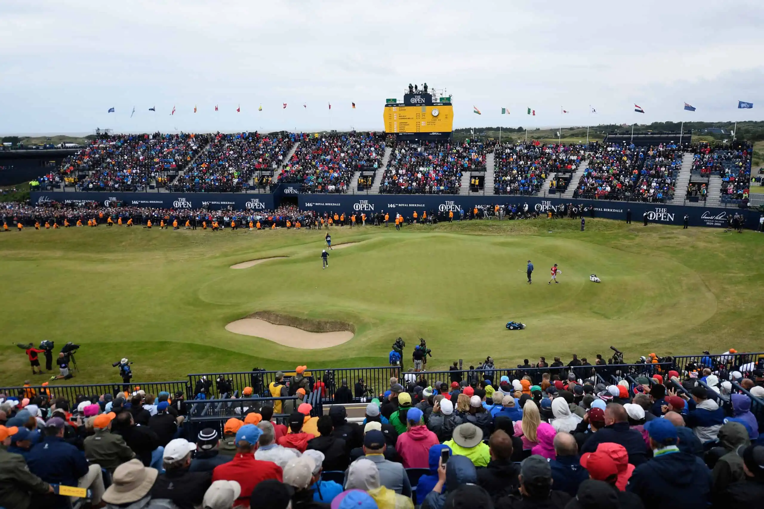 SOUTHPORT, ENGLAND - JULY 23: Jordan Spieth of the United States and Matt Kuchar of the United States on the 18th green during the final round of the 146th Open Championship at Royal Birkdale on July 23, 2017 in Southport, England. (Photo by Warren Little/R&A/R&A via Getty Images)