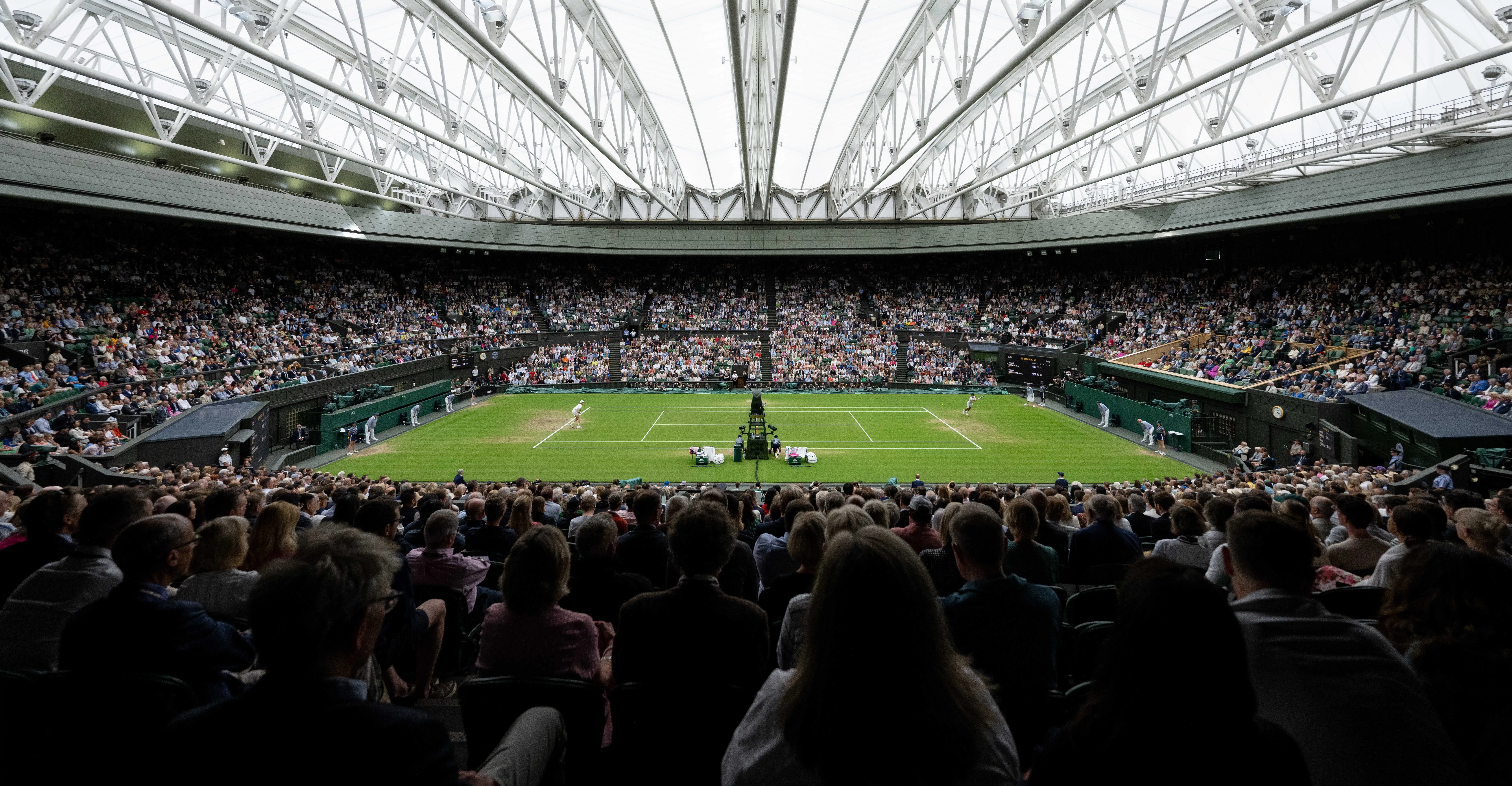 558020 Jannik Sinner (ITA) playing against Novak Djokovic (SRB) in the semi-final of the Gentlemen's Singles on Centre Court at The Championships 2023. Held at The All England Lawn Tennis Club, Wimbledon. Day 12 Friday 14/07/2023. Credit: AELTC/Jonathan Nackstrand